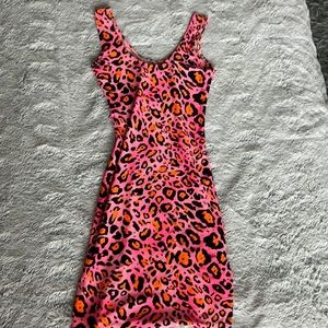 Coquetry body con dress M glows under black lights